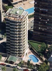 a large building with a lot of windows at Apartamentos Maria Victoria in Benidorm
