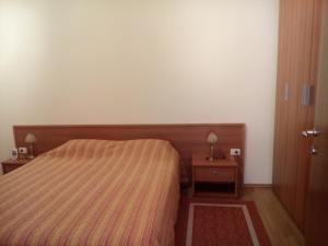 Łóżko lub łóżka w pokoju w obiekcie Apartments Villa Fernetich
