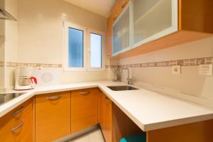 A kitchen or kitchenette at Granada Home Centro Még 37 kép