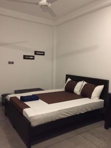Postel nebo postele na pokoji v ubytování US Motel Colombo