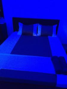 Postel nebo postele na pokoji v ubytování US Motel Colombo