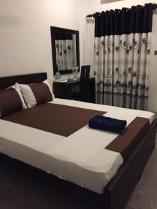 Postel nebo postele na pokoji v ubytování US Motel Colombo