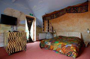 Säng eller sängar i ett rum på Hotel de Plataan Delft Centrum