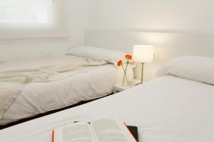 Posteľ alebo postele v izbe v ubytovaní 08028 Apartments