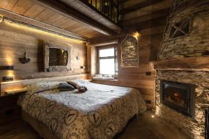 Postel nebo postele na pokoji v ubytování Brieis Relais Alpino
