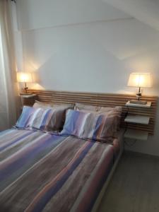 Un pat sau paturi într-o cameră la Casa Corona