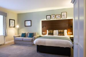 A bed or beds in a room at Balloch House by Innkeeper's Collection