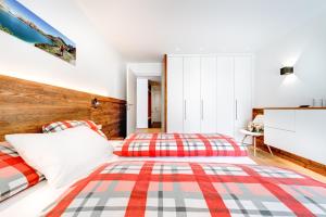 Voodi või voodid majutusasutuse Appartement Zimba Blick by A-Appartments toas