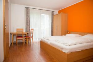 Postel nebo postele na pokoji v ubytování YoHo - International Youth Hostel