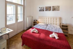 Postel nebo postele na pokoji v ubytování Dušní Apartments