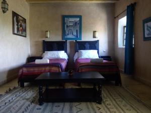 Postel nebo postele na pokoji v ubytování La Kasbah d'Ouzoud