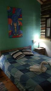 Tempat tidur dalam kamar di Refugio de las Sierras