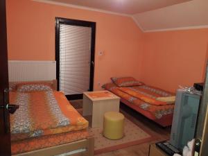 Ein Bett oder Betten in einem Zimmer der Unterkunft Rooms Violeta