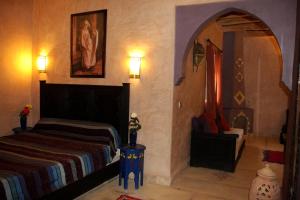 Postel nebo postele na pokoji v ubytování La Kasbah d'Ouzoud