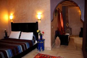 Postel nebo postele na pokoji v ubytování La Kasbah d'Ouzoud