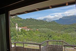 a view from a window of a mountain at Villetta Ulivi CA7 sun terrace by Gardadomusmea in Tremosine Sul Garda