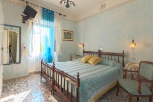 Postel nebo postele na pokoji v ubytování Camere Alisa + 14 fotografií
