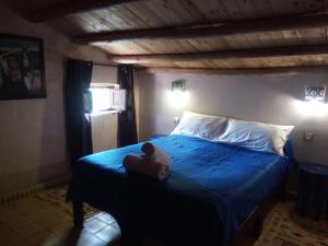 Postel nebo postele na pokoji v ubytování La Kasbah d'Ouzoud