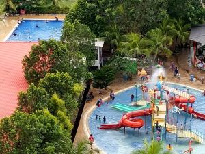 an overhead view of a water park with a water slide at CT Homestay at Lagoon Park Resort in Malacca