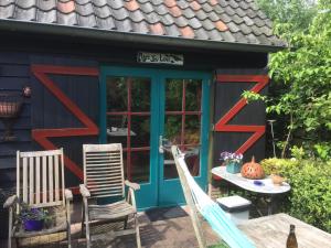 Κήπος έξω από το B&B Bij de Boomgaard
