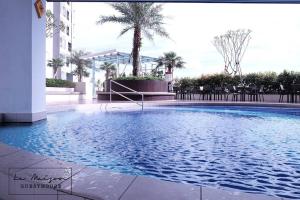 a swimming pool in the middle of a building at Le Maison GuestHouse @ Majestic Imperial in Ipoh +30 photos