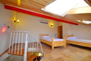 Voodi või voodid majutusasutuse Doada Hotel toas