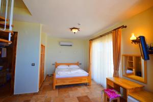 Voodi või voodid majutusasutuse Doada Hotel toas