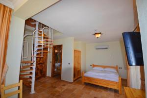 Voodi või voodid majutusasutuse Doada Hotel toas