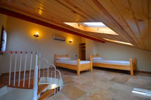 Voodi või voodid majutusasutuse Doada Hotel toas