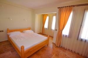 Voodi või voodid majutusasutuse Doada Hotel toas