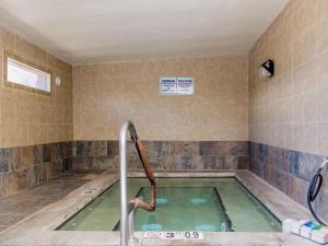 a bath room with a pool of water at Best Western Alamosa Inn in Alamosa