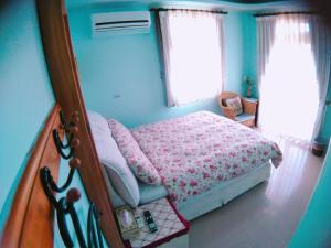 Voodi või voodid majutusasutuse Riverside B&B toas