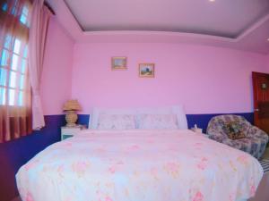 Voodi või voodid majutusasutuse Riverside B&B toas