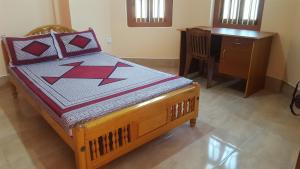 Postel nebo postele na pokoji v ubytování Tulip Guest Inn