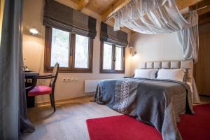 Postel nebo postele na pokoji v ubytování Forest Suites Boutique Hotel + 37 fotografií