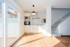 Kuchyň nebo kuchyňský kout v ubytování Apartamentos El Abuelo