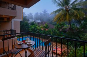
A balcony or terrace at Treehouse Blue Goa
