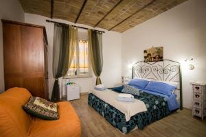Ein Bett oder Betten in einem Zimmer der Unterkunft All'Ombra Del Cupolone