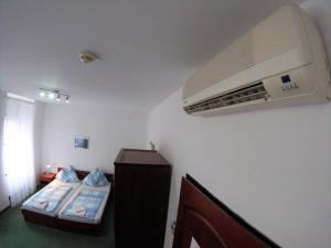 Łóżko lub łóżka w pokoju w obiekcie Pension San Francisco