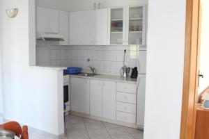 Kuchyň nebo kuchyňský kout v ubytování Villa Speranda