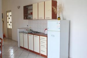 Kuchyň nebo kuchyňský kout v ubytování Villa Speranda