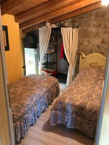 Säng eller sängar i ett rum på Casa Colli Piacentini