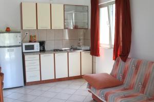 Kuchyň nebo kuchyňský kout v ubytování Villa Speranda