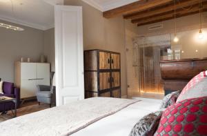 Posteľ alebo postele v izbe v ubytovaní Trafalgar Luxury