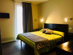 Postel nebo postele na pokoji v ubytování Pove 2.4 Hotel + 37 fotografií