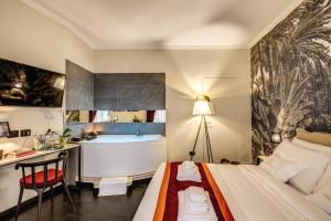 A bed or beds in a room at PAX hotel