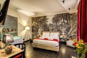 A bed or beds in a room at PAX hotel