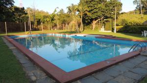 
The swimming pool at or near Parque Hotel Morro Azul
