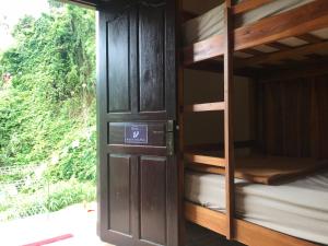 Postel nebo postele na pokoji v ubytování WW Backpackers