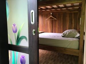 Postel nebo postele na pokoji v ubytování WW Backpackers